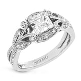 This amazing 18k white gold engagement ring features vintage-inspired design elements set with .28 ctw of white diamonds.