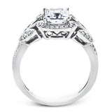 This amazing 18k white gold engagement ring features vintage-inspired design elements set with .28 ctw of white diamonds.
