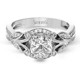 This amazing 18k white gold engagement ring features vintage-inspired design elements set with .28 ctw of white diamonds.