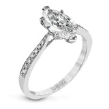 The delicate, understated design of this lovely white gold ring is elevated by .27 ctw of round white diamond accents.