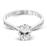 The delicate, understated design of this lovely white gold ring is elevated by .27 ctw of round white diamond accents.