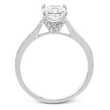 The delicate, understated design of this lovely white gold ring is elevated by .27 ctw of round white diamond accents.