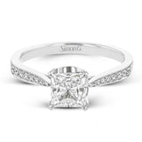The delicate, understated design of this lovely white gold ring is elevated by .27 ctw of round white diamond accents.