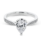 The delicate, understated design of this lovely white gold ring is elevated by .27 ctw of round white diamond accents.