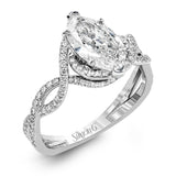 Classic with a modern twist, this white gold engagement ring features .50 ctw of sparkling white diamonds in a dramatic openwork design.