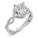 Classic with a modern twist, this white gold engagement ring features .50 ctw of sparkling white diamonds in a dramatic openwork design.