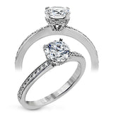 18K white gold engagement ring featuring .22cttw diamonds.  (center stone sold separately)