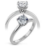 18K white gold solitare featuring .07cttw diamond underhalo.  (center stone sold separtately)