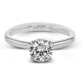 This singular engagement accents the center stone with a touch of .03 ctw of diamonds around the secure basket setting, while the band shines in high polish metal.
