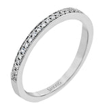 This 18k white gold ring creates the look of two rings in one, with a center design of .66 ctw of sapphires accented by .61 ctw of white diamonds.