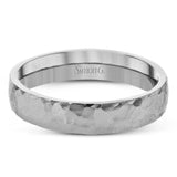 This band is perfect for everyday wear, crafted in long lasting 14k gold with a enduring hammered finish.