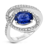 A beautiful 2.04 ct tanzanite center stone anchors this swirling ring, set with .38 ctw of accent diamonds.