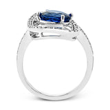 A beautiful 2.04 ct tanzanite center stone anchors this swirling ring, set with .38 ctw of accent diamonds.