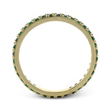 This simple 18k band adds a perfect touch of color with .38 ctw of emeralds.