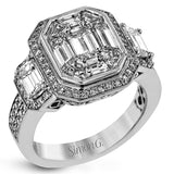 Make a bold statement with this diamond ring from the mosaic collection. Set in 18k white and rose gold, this ring features over 3cttw of white diamonds and .18cttw pink diamonds.