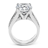 This engagement ring sure is a stunner with a wide band set with a full 1.20 ctw of white diamonds.