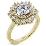 Crafted from 18k gold, this halo ring features a stunning .36 ctw of round diamonds and .49 ctw of baguette shaped diamonds.