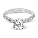 This stunning 18K engagement ring has pave set diamonds of 0.66 ctw., on all 3 sides for a sleek look