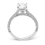 This stunning 18K engagement ring has pave set diamonds of 0.66 ctw., on all 3 sides for a sleek look