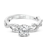 A modern, unique design, this 18k gold engagement ring featuring an intertwined design set with .22 ctw of white diamonds.