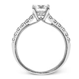 This classic 18k gold engagement ring setting contains .37 ctw of sparkling white diamonds.