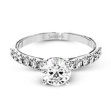 This classic 18k gold engagement ring setting contains .37 ctw of sparkling white diamonds.
