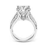 Crafted from 18k white gold, this modern engagement ring commands attention with 1.48 cttw of Baguette diamonds in combination with .39 cttw of round diamonds.