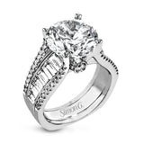 Crafted from 18k white gold, this modern engagement ring commands attention with 1.48 cttw of Baguette diamonds in combination with .39 cttw of round diamonds.
