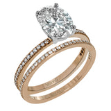 The classic, streamlined design of this 18k rose gold wedding set is accented by .30 ctw of sparkling white round brilliant diamonds.