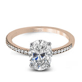 The classic, streamlined design of this 18k rose gold wedding set is accented by .30 ctw of sparkling white round brilliant diamonds.