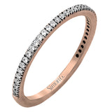 The classic, streamlined design of this 18k rose gold wedding set is accented by .30 ctw of sparkling white round brilliant diamonds.