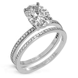 The classic, streamlined design of this 18k rose gold wedding set is accented by .30 ctw of sparkling white round brilliant diamonds.
