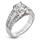 This distinctive ring features a center row of .75 ctw of baguette diamonds outlined on either side by .43 ctw of round diamonds.