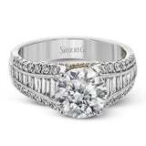 This distinctive ring features a center row of .75 ctw of baguette diamonds outlined on either side by .43 ctw of round diamonds.
