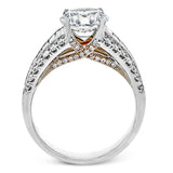 This distinctive ring features a center row of .75 ctw of baguette diamonds outlined on either side by .43 ctw of round diamonds.