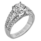 This distinctive ring features a center row of .75 ctw of baguette diamonds outlined on either side by .43 ctw of round diamonds.