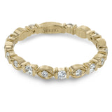 This gorgeous 18k yellow gold ring is perfect to wear in a stack, or as a statement on its own. It features .37 ctw of white diamonds.