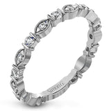 This gorgeous 18k white gold ring is perfect to wear in a stack, or as a statement on its own. It features .38 ctw of white diamonds.