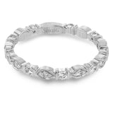 This gorgeous 18k white gold ring is perfect to wear in a stack, or as a statement on its own. It features .38 ctw of white diamonds.