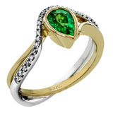 A perfect gift for yourself or your loved one crafted in 18K white and yellow gold featuring a .59ct emerald and .15cttw diamonds.