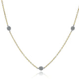 This delicate necklace is dotted with stations of sparkling pave set diamonds between gold chain. This piece would be perfect for layering or for making an everyday statement on its own.