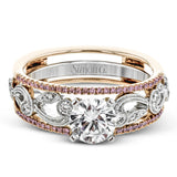 This remarkable set provides the looks of three rings, with a yellow gold ring guard set with yellow diamonds that encompasses the center white gold engagement ring.