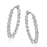 This pair of 18k yellow gold hoop earrings are the perfect size for everyday wear, and shine with .33 ctw of yellow diamonds.