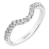 This glamorous white gold ring features 1.01 ctw of round white diamonds and .62 ctw of pear shaped white diamonds as a dazzling backdrop for the center stone