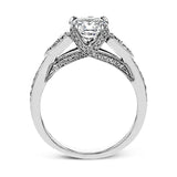 This absolutely charming white gold ring features a subtle, nature-inspired design as well as .32 ctw of round white diamonds.