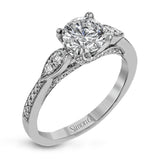 This absolutely charming white gold ring features a subtle, nature-inspired design as well as .32 ctw of round white diamonds.
