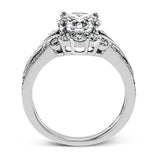 Turn heads with this stunning white gold ring that glitters with an impressive .58 ctw of round white diamond accents.