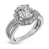 Turn heads with this stunning white gold ring that glitters with an impressive .58 ctw of round white diamond accents.