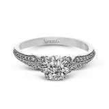 This remarkable white gold ring features .18 ctw of round white diamonds and delicate milgrain edging for a sleek, romantic look.