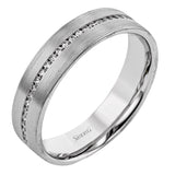 Timless design revealed in this 14k yellow gold band featuring .55cttw diamonds.